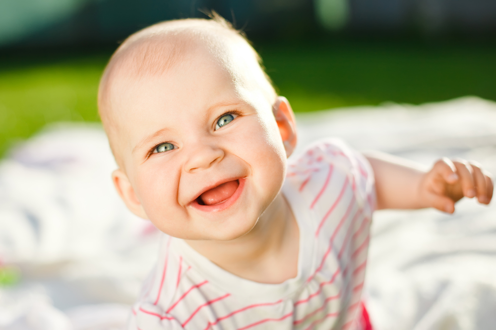 Wann lachen Babys das erste Mal?